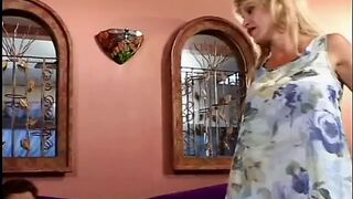 Milf is on her knees swallowing a big cock before getting fucked